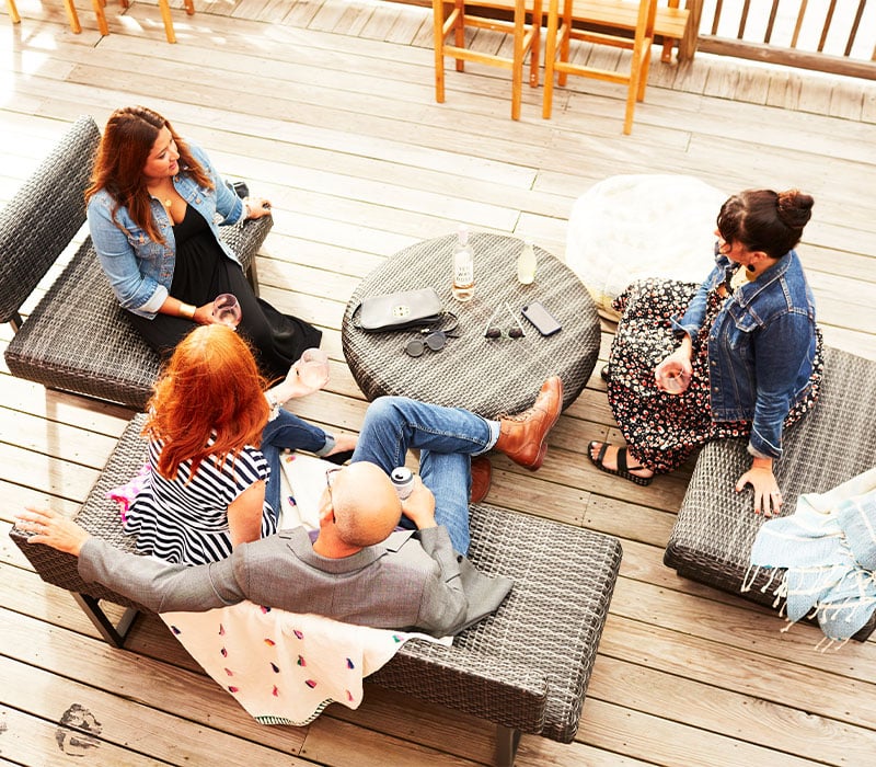 A group of people sitting and chatting